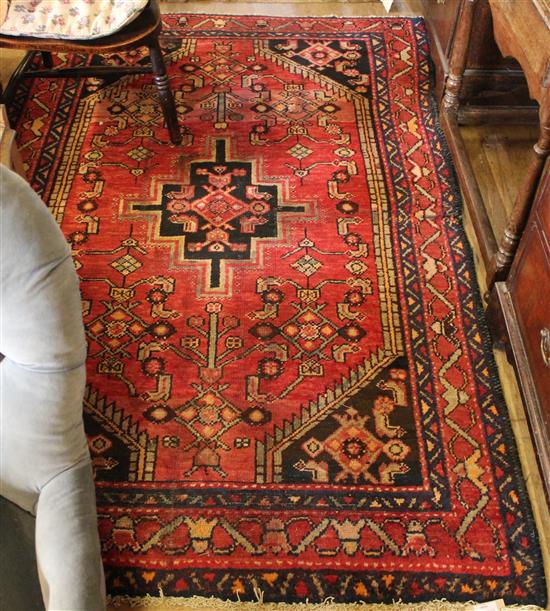 Red ground Persian rug